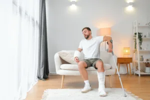 injured man on couch